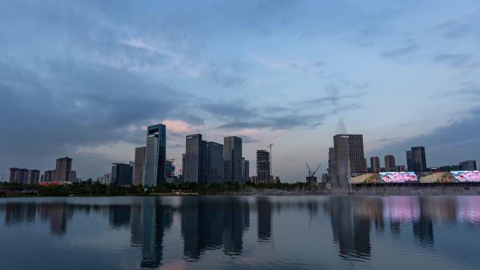 成都天府新区秦皇湖高层建筑日转夜天黑亮灯