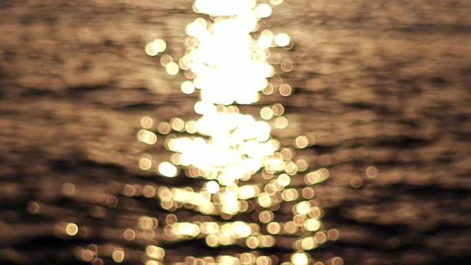 海面波浪光斑阳光照射海面虚焦光点