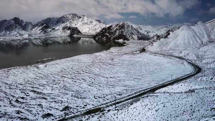 航拍4K汽车行驶青海甘肃新疆冰川雪地湖面