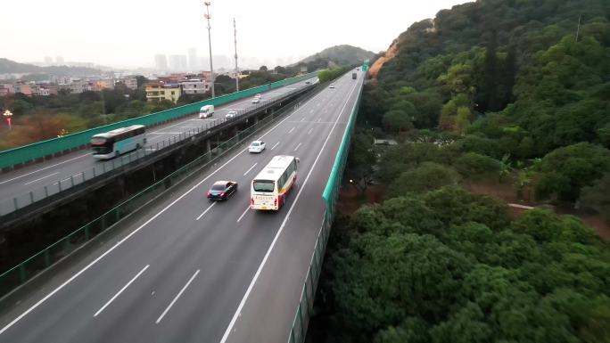 航拍大巴车行驶在高速路
