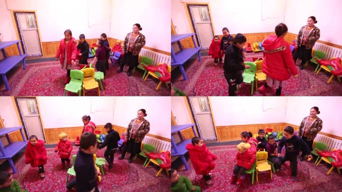 新疆幼儿园里玩耍的师生