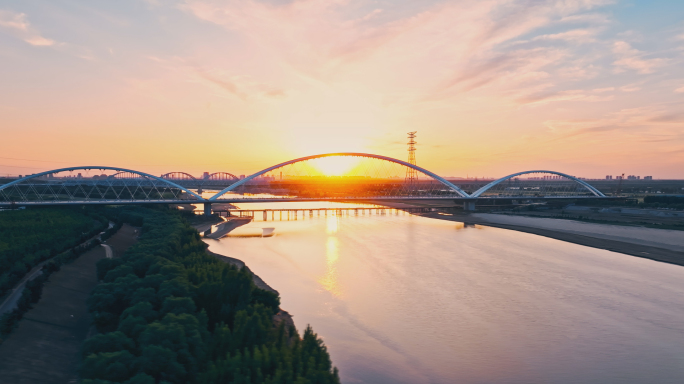 夕阳下的齐鲁黄河大桥航拍4K