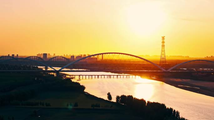 夕阳下的齐鲁黄河大桥航拍4K