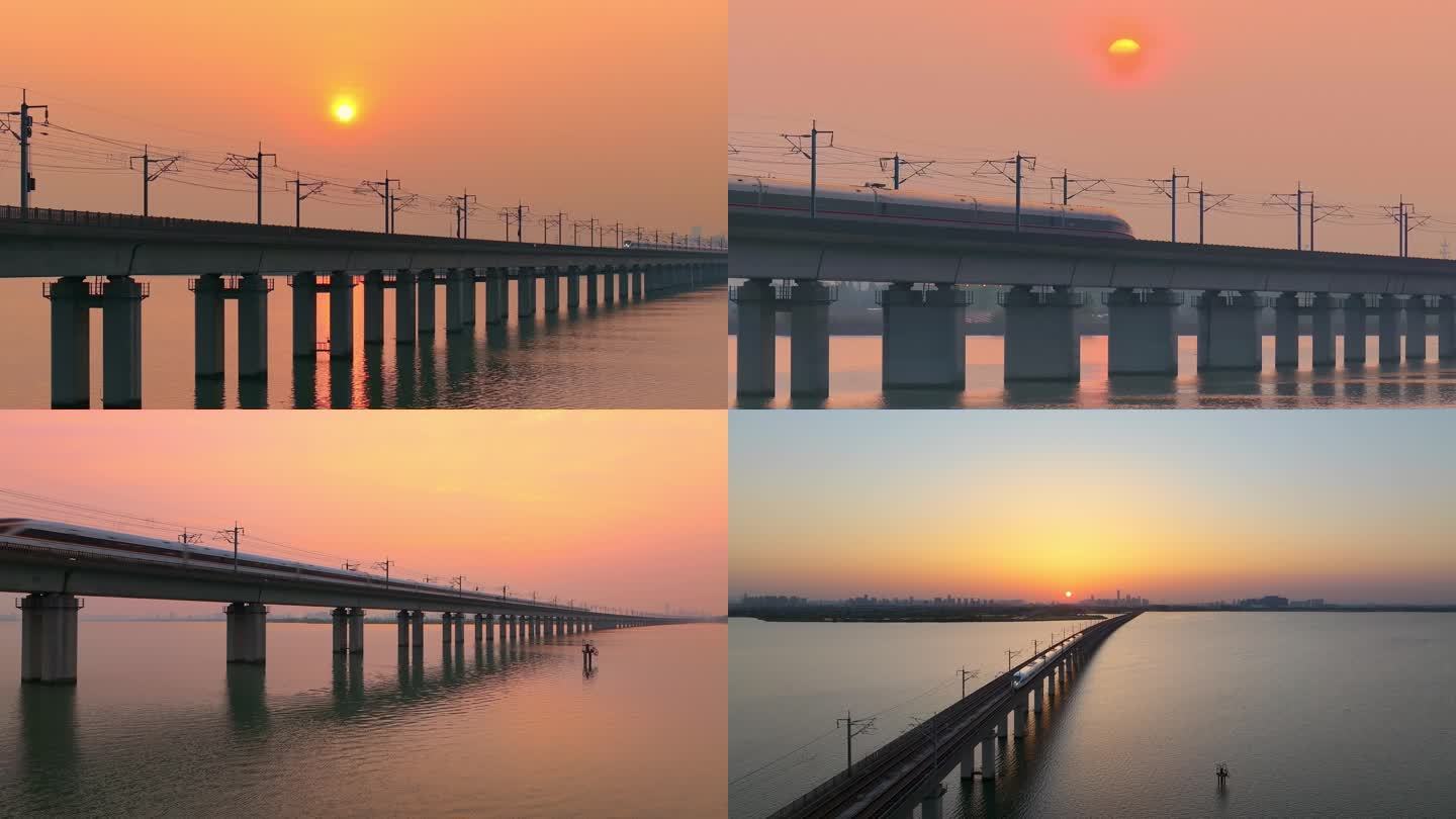 日落晚霞里苏州阳澄湖京沪高铁驶过航拍风景