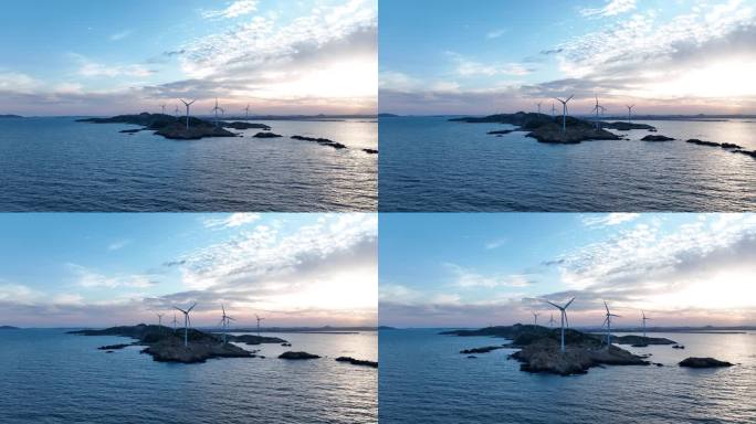 海上小岛日落日出风车航拍海岛海洋风力发电