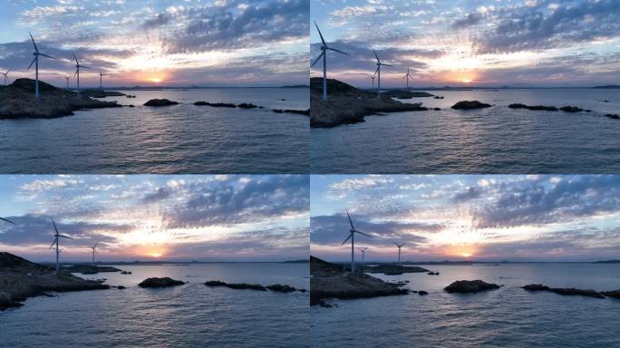 海上小岛日落日出风车航拍海岛海洋风力发电