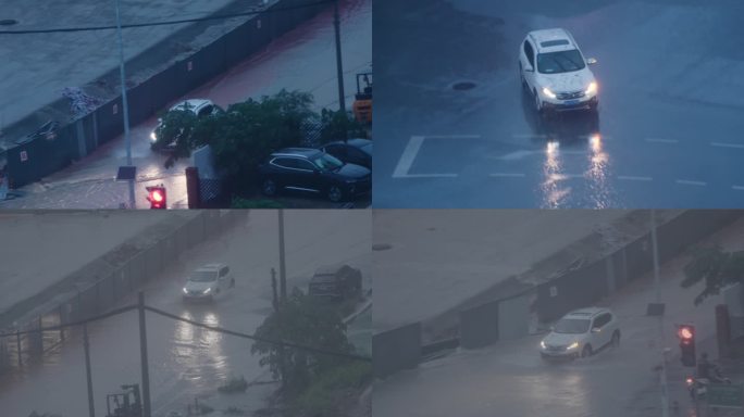 暴雨天车辆驶过积水街道