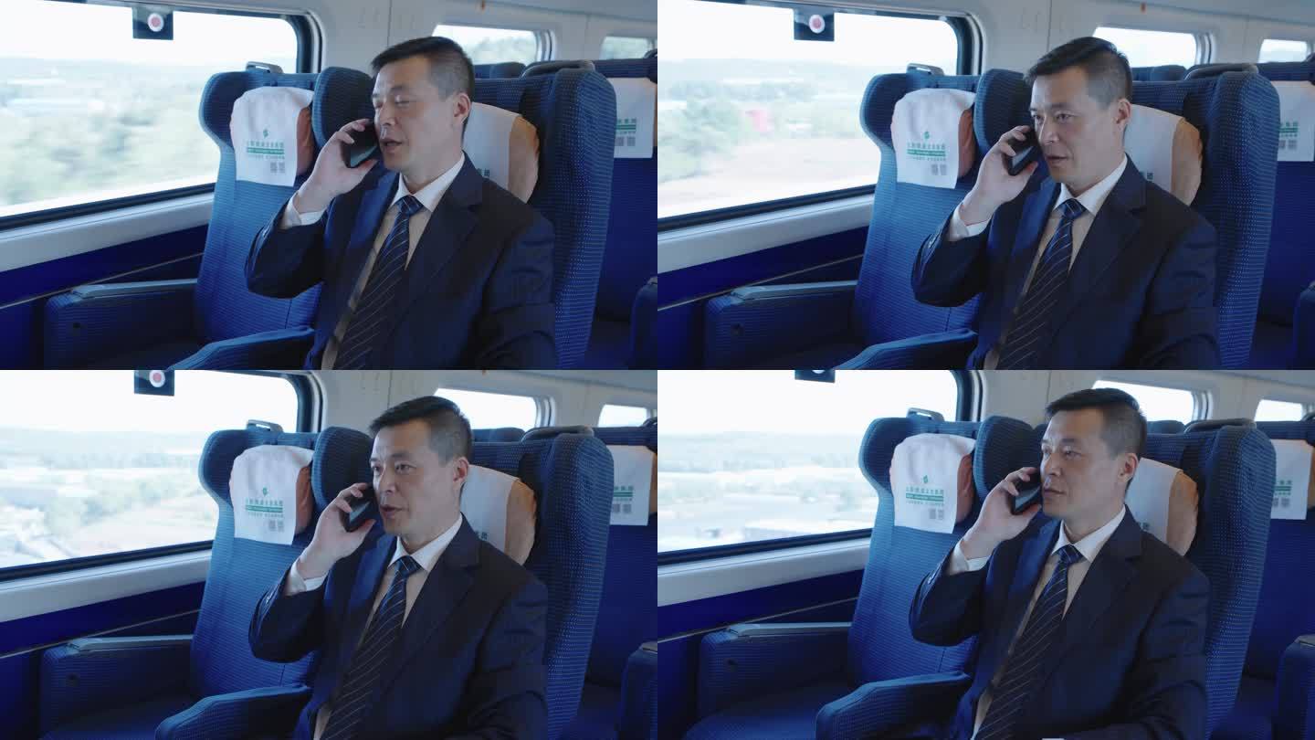 中中国高铁 和谐号 商务头等舱 看手机
