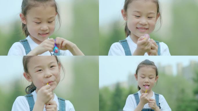 小女孩吃棒棒糖小女孩开心