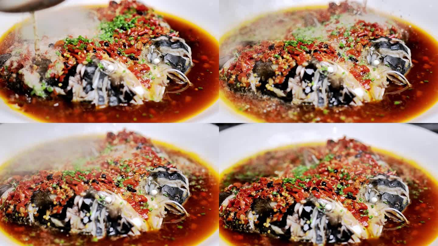 剁椒鱼头美食 经典中国菜 浇热油