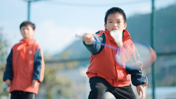 羽毛球打羽毛球运动健儿中小学体育运动锻炼