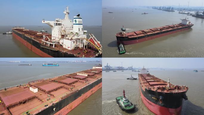 多艘拖轮协助超大型船舶离码头