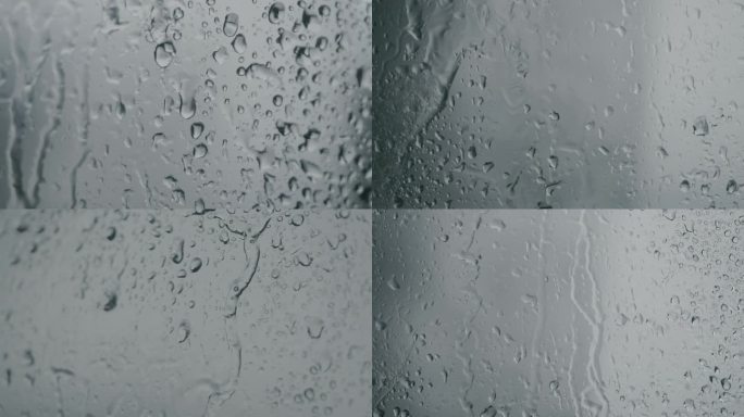 下雨天玻璃 雨水打湿玻璃 水珠下落