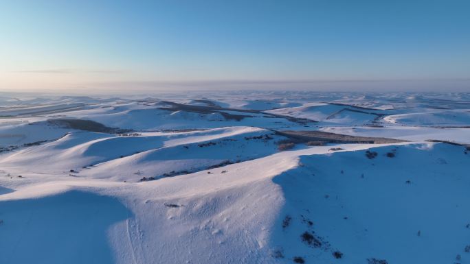 航拍内蒙古冬季雪原暮色