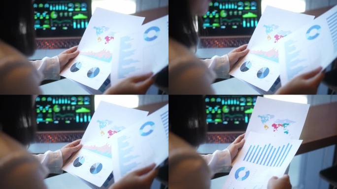 职业女性在笔记本电脑上看财务报表