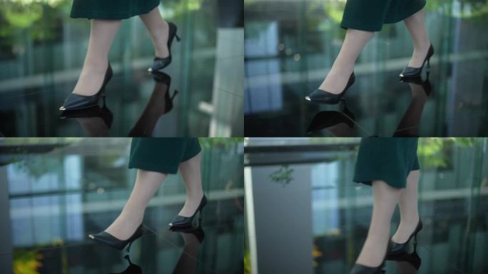 职业女性穿着皮鞋走在办公室脚步特写