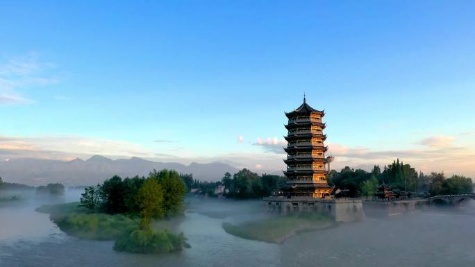 四川省崇州市元通古镇晨曦云雾雪山