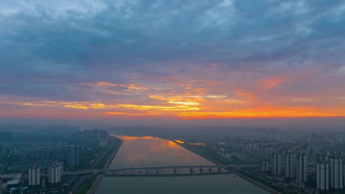 眉山市东坡区岷江一桥片区日出朝霞航拍延时