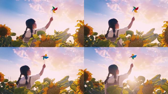 夕阳下小孩玩风车