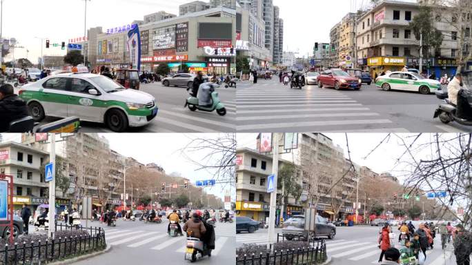 冬季小县城车水马龙的十字路口街景实拍