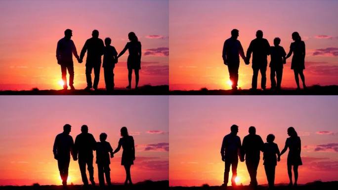 夕阳太阳剪影下的的一家人温馨暖意