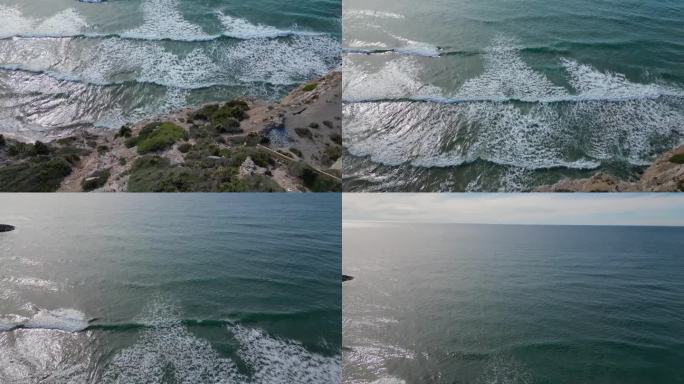 鸟瞰图，巴塞罗那吉尼斯塔港的岩石海岸线和海浪