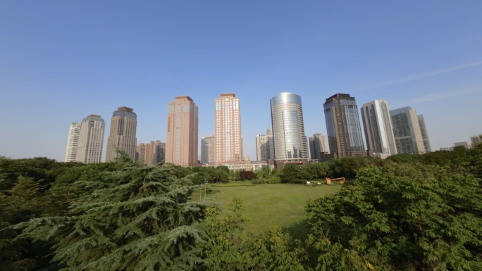 早晨城市绿化美景湿地公园商务中心写字楼