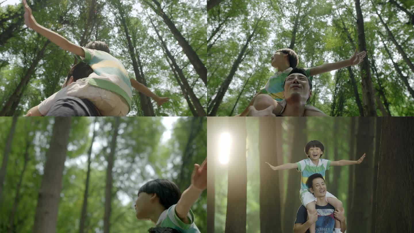 孩子骑在爸爸肩膀幸福开心美好生活