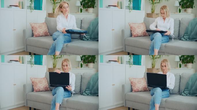 有进取心的女商人在笔记本电脑上远程工作