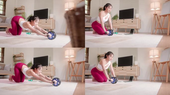 一名年轻女子在家里的平板电脑上跟随在线教程，学习并在抖音秀上分享在线社交媒体应用程序，用健身车锻炼身