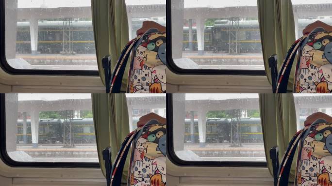 火车车窗外站台小雨
