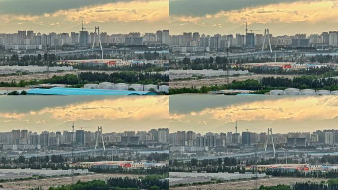 新疆阿克苏纺织大桥夕阳电视塔航拍4K