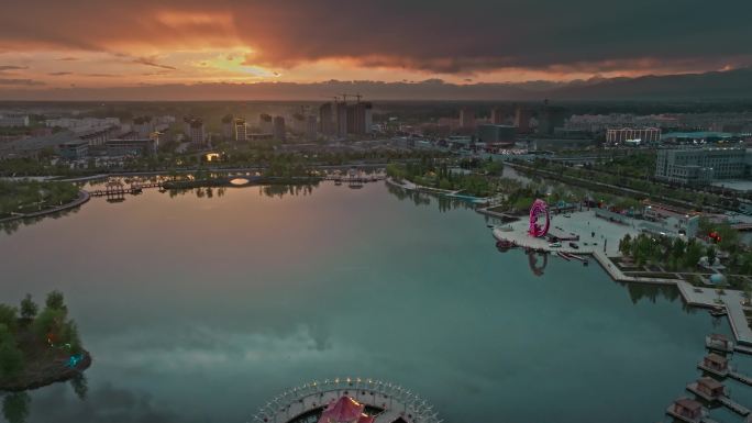 新疆阿克苏温宿夕阳龙泉湖公园航拍4K