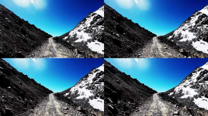 越野驾驶，翻越冰雪覆盖的岩石山峰
