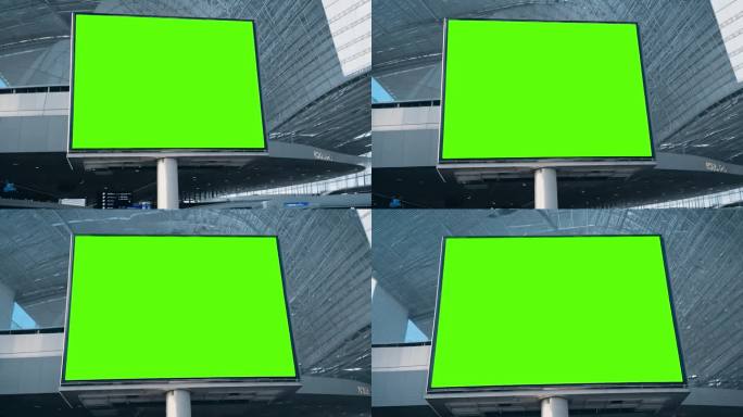 机场里的一块绿屏广告大屏