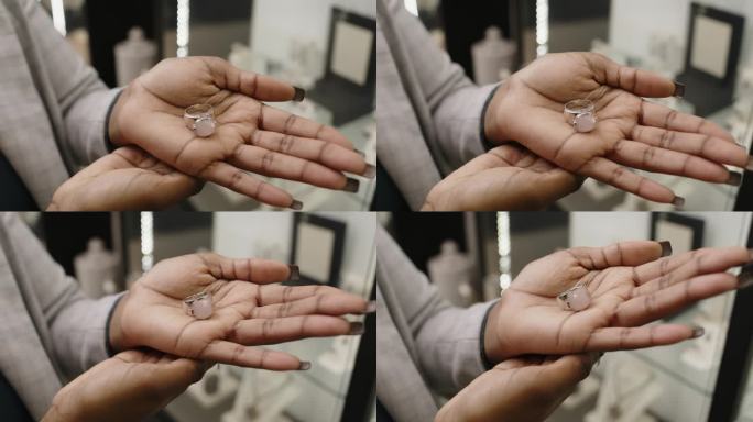 黑人女士的手展示镶嵌宝石的独家戒指