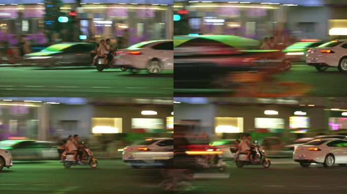 一家三口骑电动车过马路