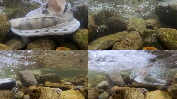 鞋子穿过溪水