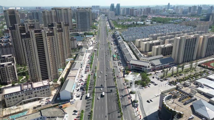 双向八车道畅通道路小区周边交通实景航拍