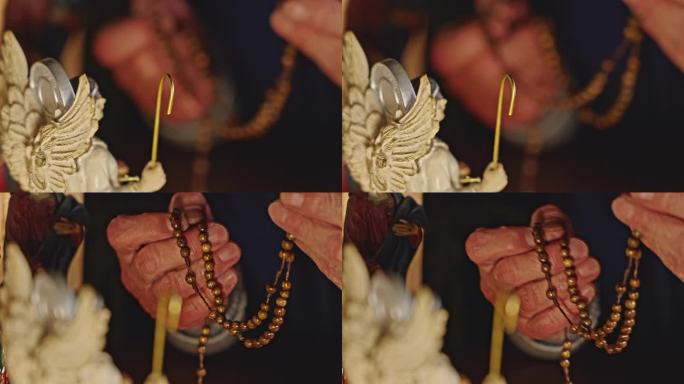 圣母之手，祈祷念珠，耶稣玛利亚和天使雕像
