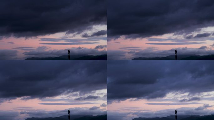 夏日夕阳信号塔上空黑压压乌云延时摄影