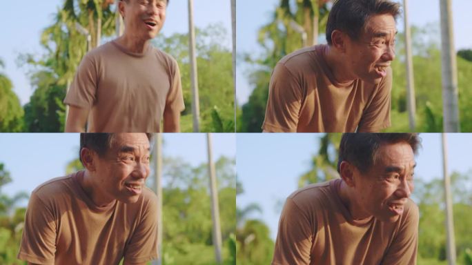 亚洲老人在花园里运动时感到疲惫不堪。迷人的成熟老年运动员在公园里练习健身时深呼吸休息。