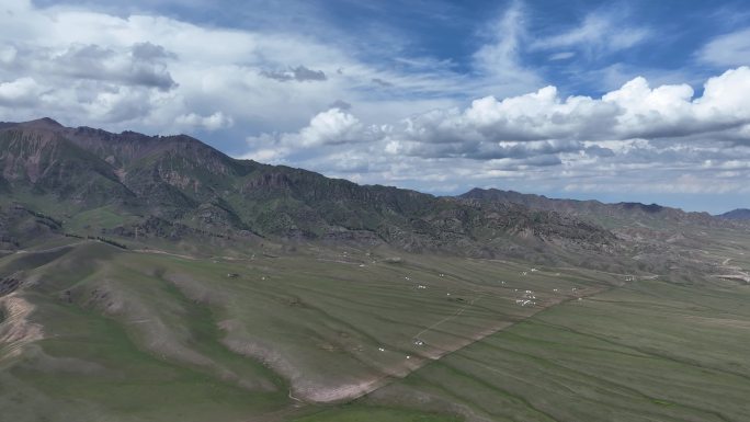 航拍新疆赛里木湖风景区北麓山坡夏季风景