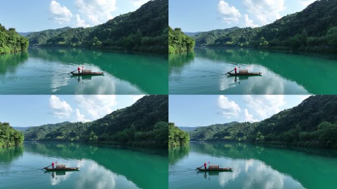 小东江上一只小木船正在撒网捕鱼 青山绿水