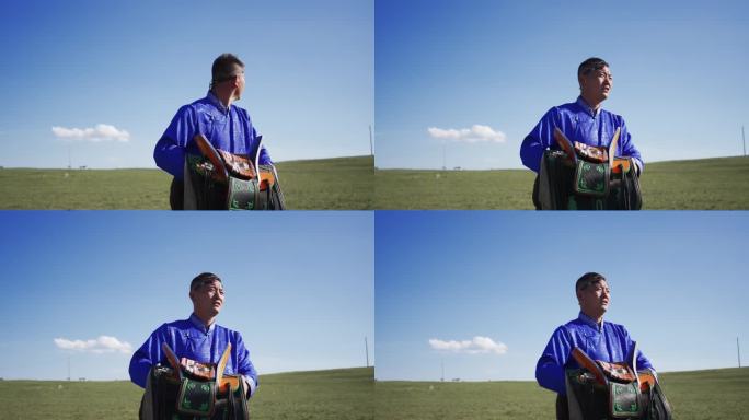 蒙古族牧民抱着马鞍走在草原上
