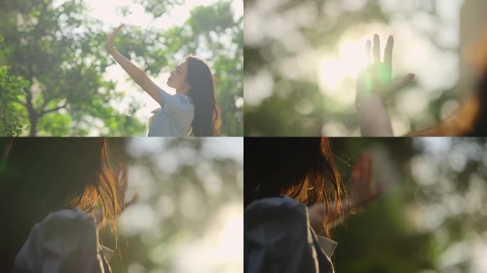 唯美女孩伸手逆光场景