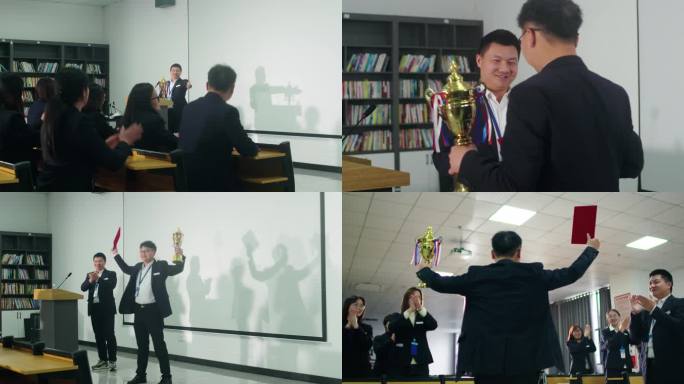 企业领导在会议室舞台上给优秀员工颁发奖杯