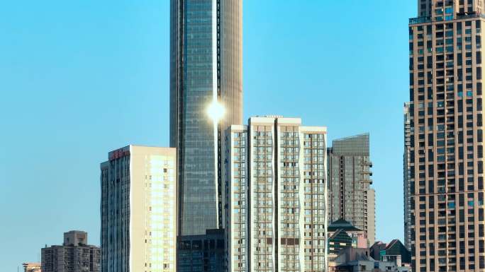 清晨阳光城市高楼大厦日出重庆城市航拍4k