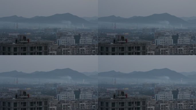 清晨晨雾阳光下的城市