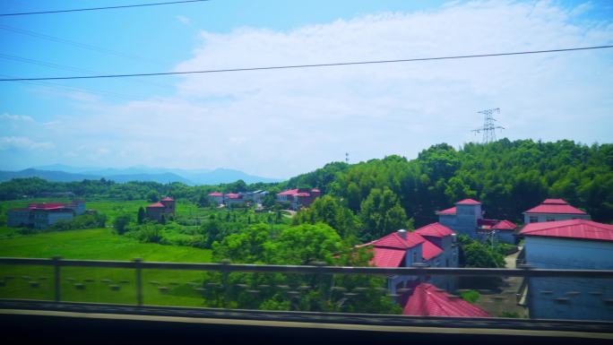行进中的高铁沿路风光  新农村 青山绿水